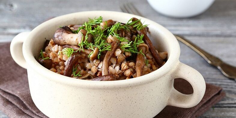 Buckwheat porridge with mushrooms for lunch in the healthy food menu
